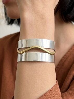 Vintage Taxco Mexico wide sterling silver cuff bracelet with brass accent